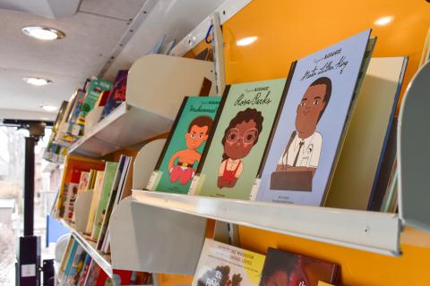 View inside Evie, the Mobile Library, of books on the shelves