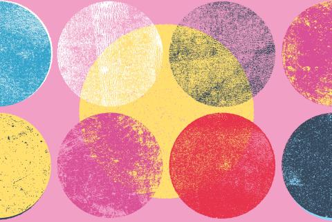 Colorful circles with a wood carved texture overlap on a pink background.