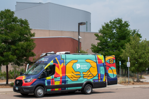 Evie, the Mobile Library, parked at the Museum of Discovery